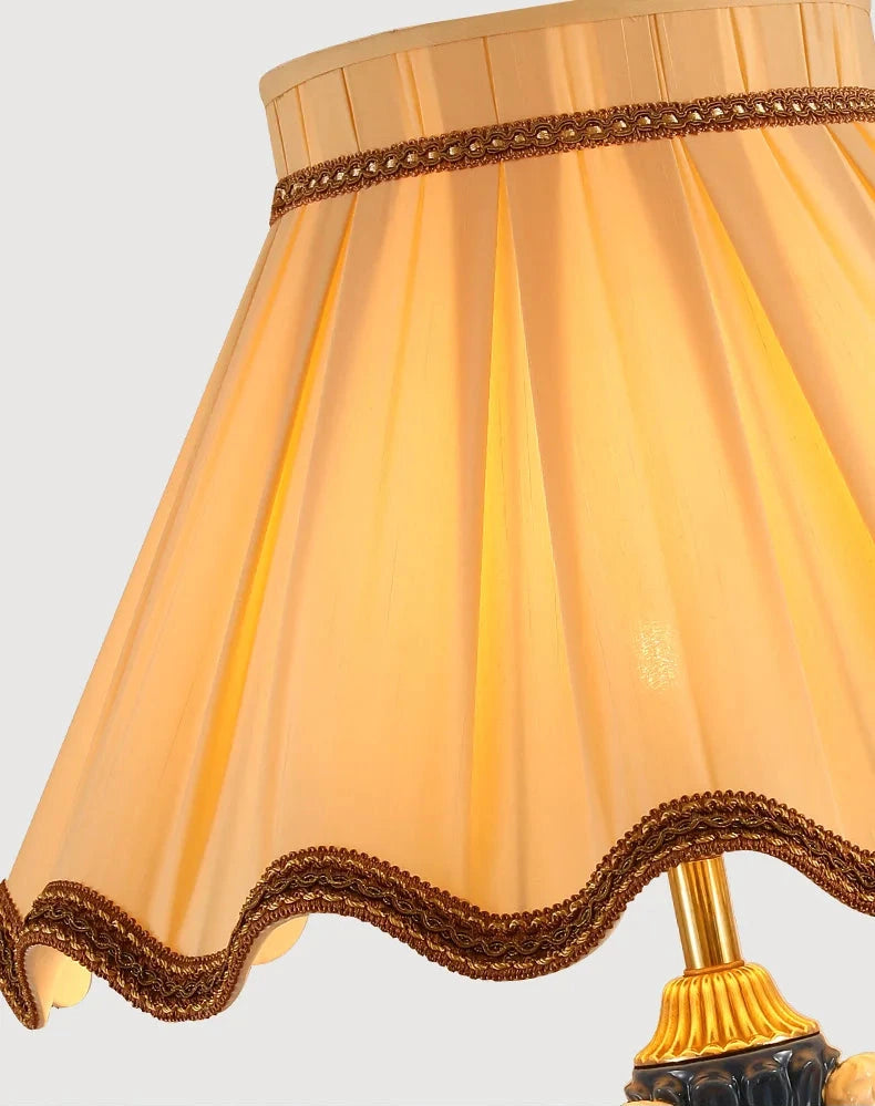 Decorative French Brass Table Lamp with Fabric Shade and White Ceramic Angel
